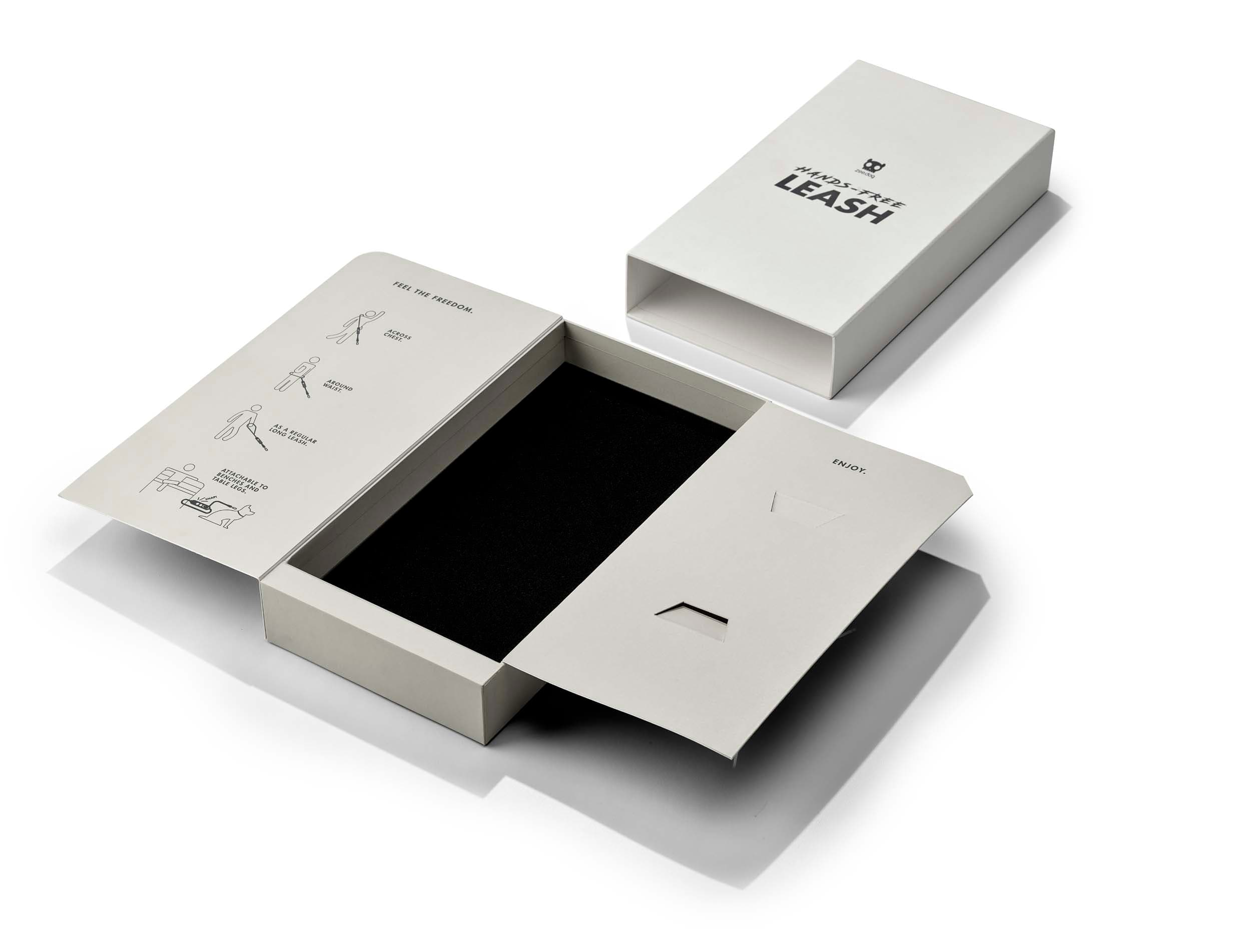 Zee Dog structural packaging with wing-opening rigid box, foam insert, and instructional panel